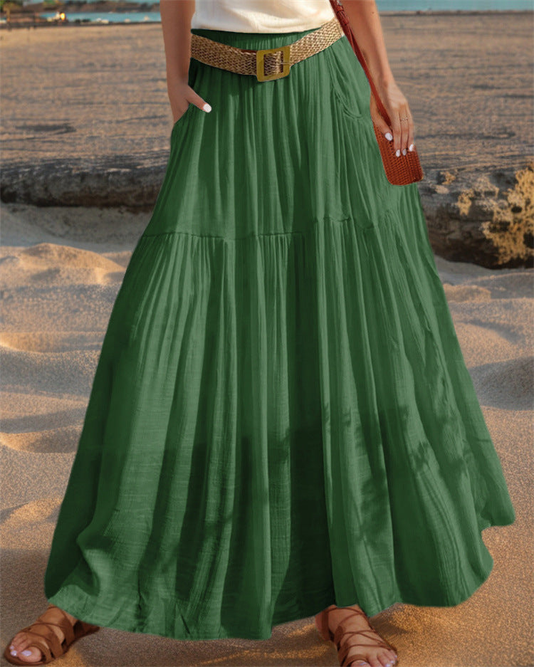 Maxi flared skirt for women with elegant pleated draping and practical pockets Lune London