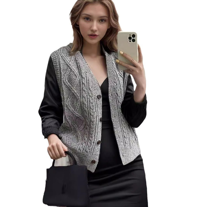 Women's knitted jacket with a modern cable pattern and chic elegant buttons.