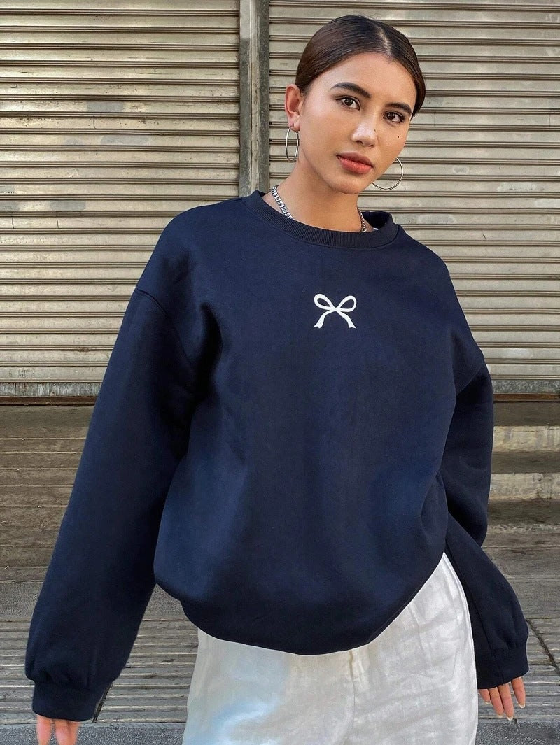 Sweat à capuche confortable pour femmes avec motif de nœud à la mode Chic & Stil