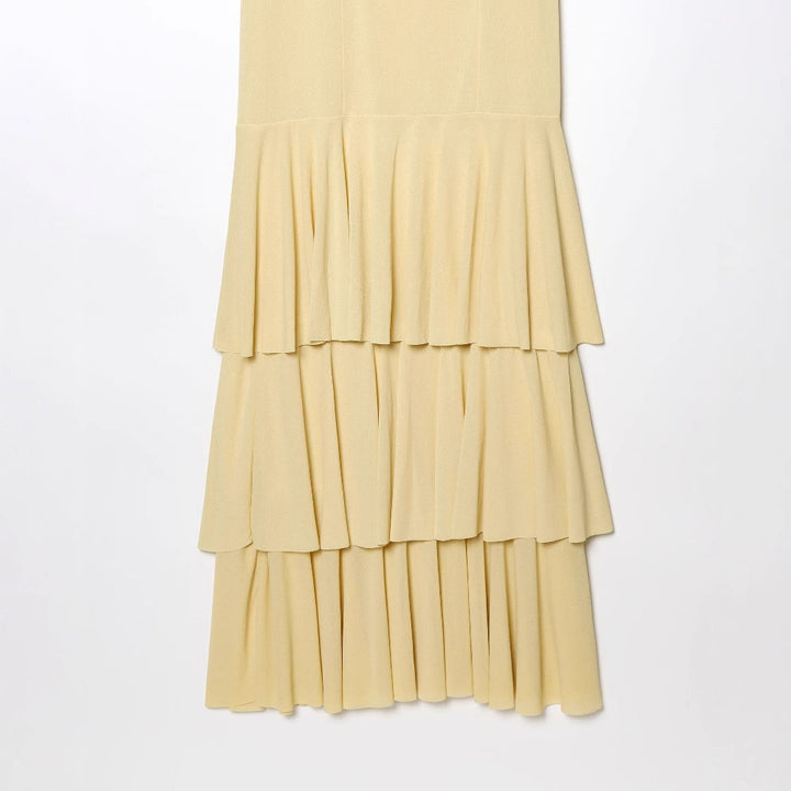 Maxi dress for women with voluminous ruffle details and adjustable spaghetti straps Lune London