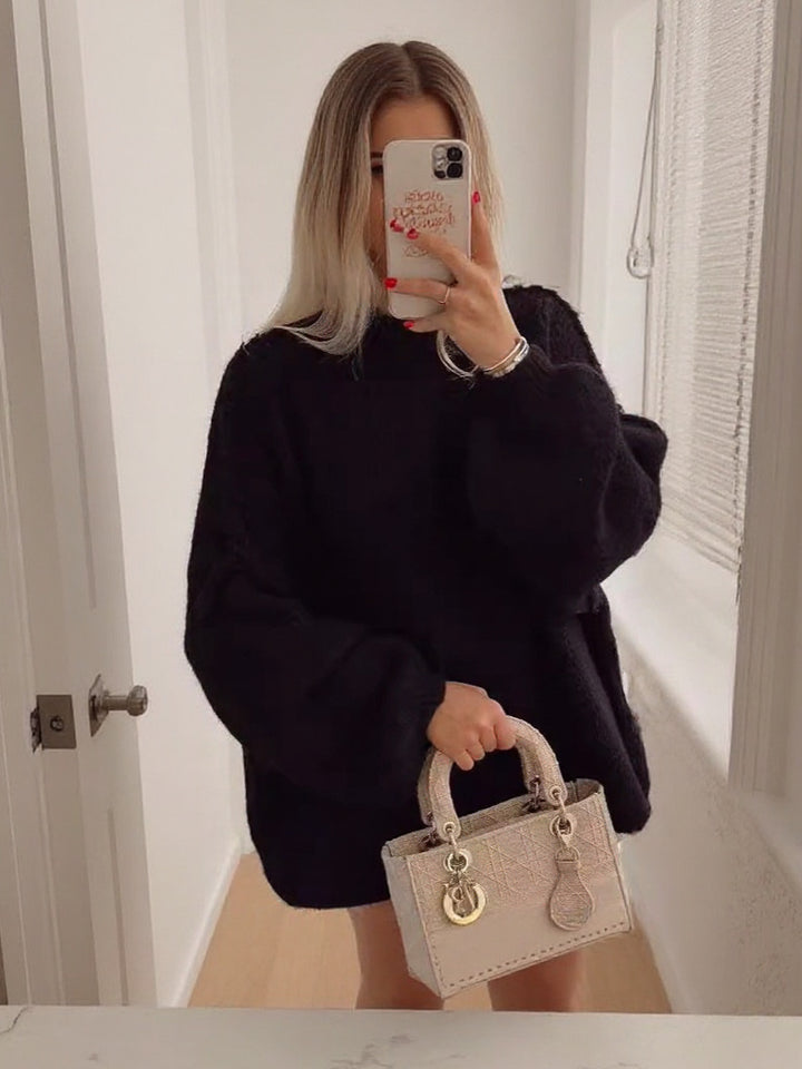 Pull en tricot surdimensionné pour femmes avec des manches volumineuses et un matériau doux Chic & Stil