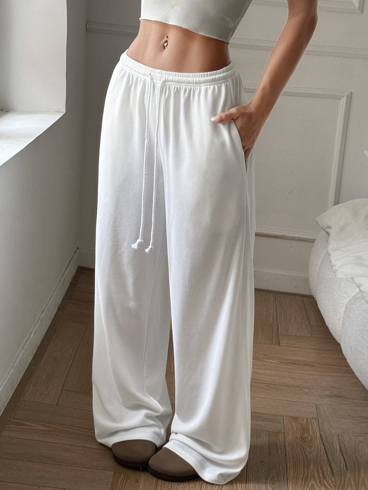 Loose and comfortable summer pants for women with elastic waistband and drawstring Lune London
