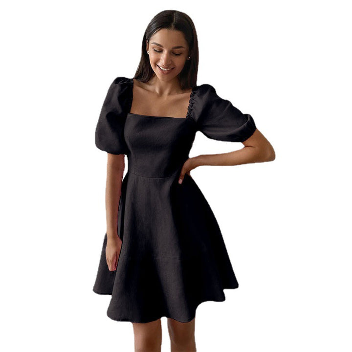 Women's Playful Dress with Generous Puff Sleeves and Swinging Hem Lune London
