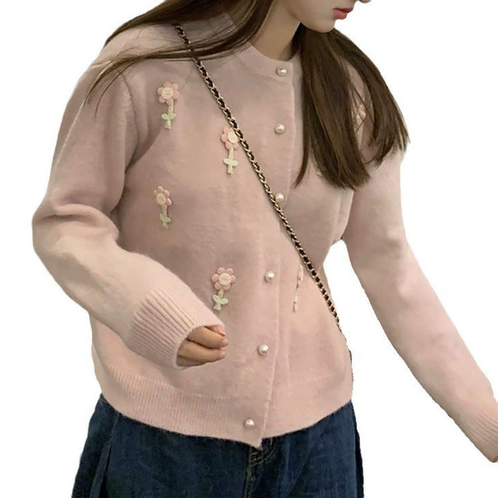 Knit jacket for women with elaborate floral appliqués and elegant pearl buttons Lune London
