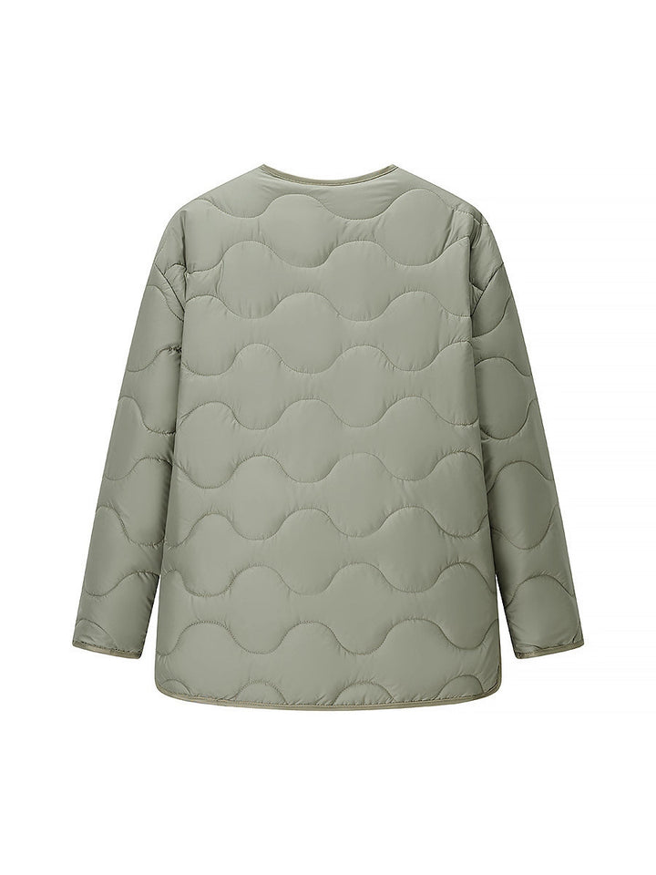 Quilted transition jacket for women with a soft fabric texture and practical snap buttons Lune London