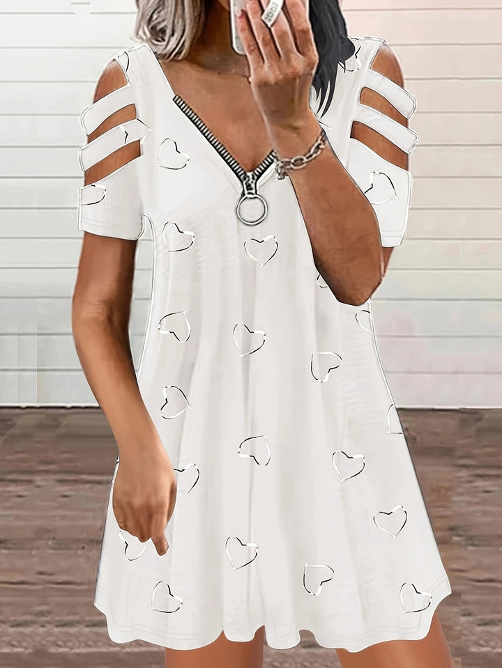 Casual dress for women with cut-out sleeves and heart pattern Lune London