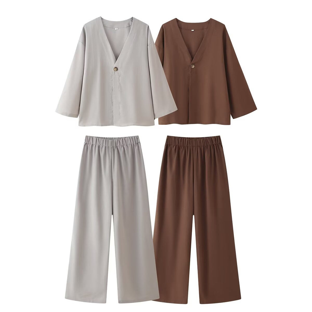 Ladies outfit consisting of an elegant V-neck blouse and wide palazzo pants Lune London