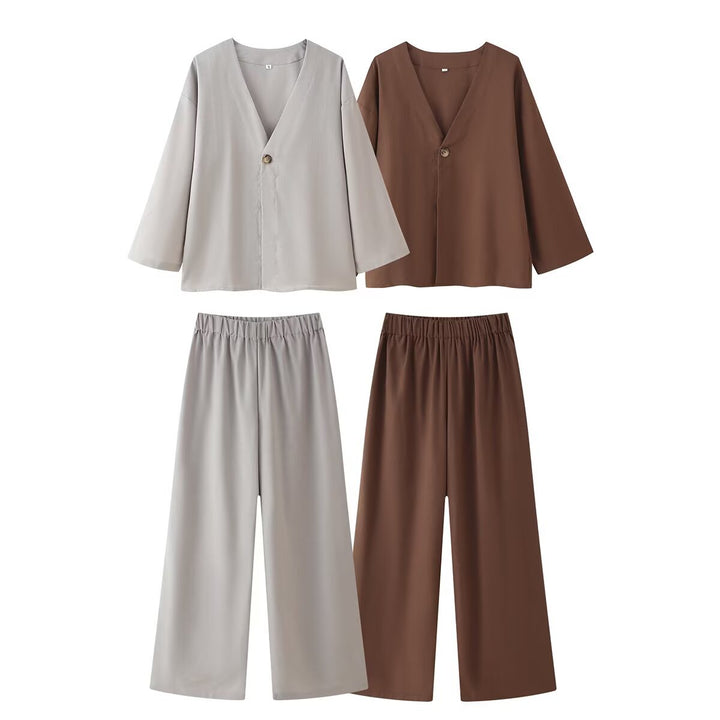 Ladies outfit consisting of an elegant V-neck blouse and wide palazzo pants Lune London