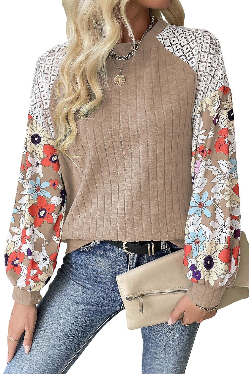 Women's sweater with a playful shape featuring a chic floral sleeve design