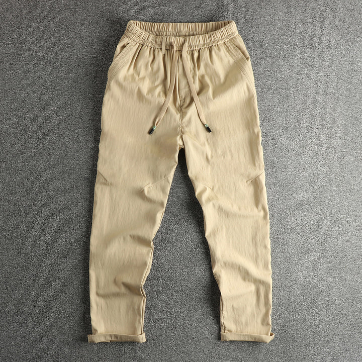 Men's athletic leisure pants with elastic waistband and practical drawstring Lune London
