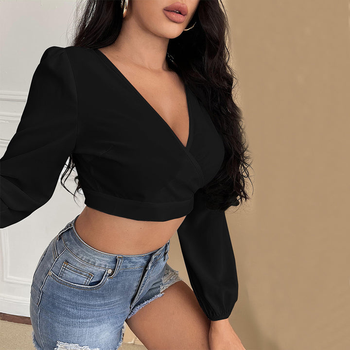 Top cropped féminin avec décolleté en V profond et manches bouffantes élégantes Chic & Stil