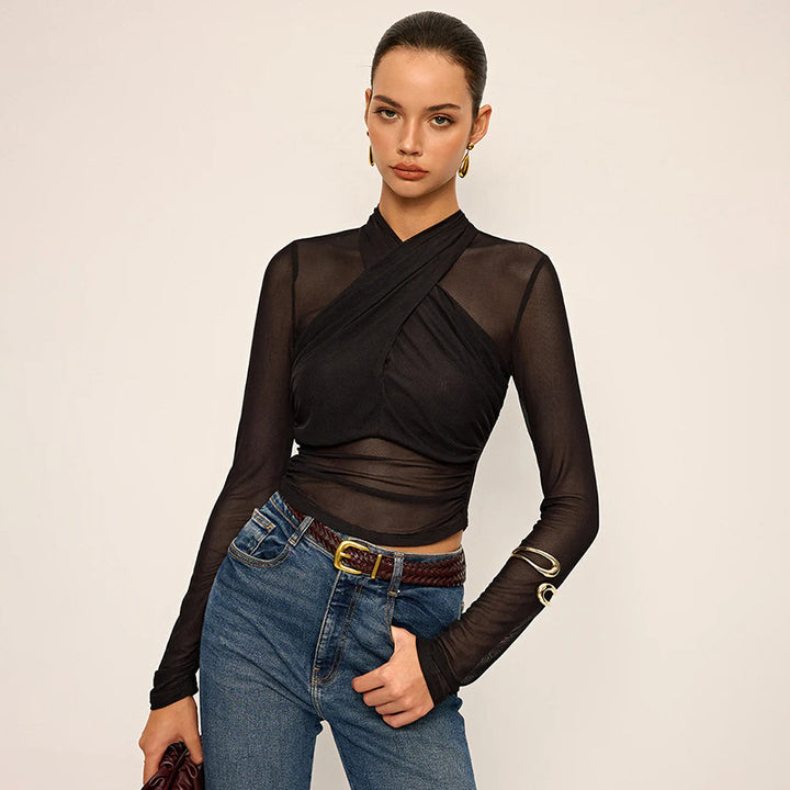 Women Elegant long sleeve top with wrapped design and transparent inserts Lune London