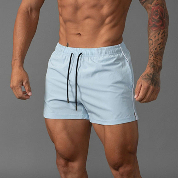 Shorts de bain sportifs pour hommes avec taille élastique et matériau à séchage rapide Lune London
