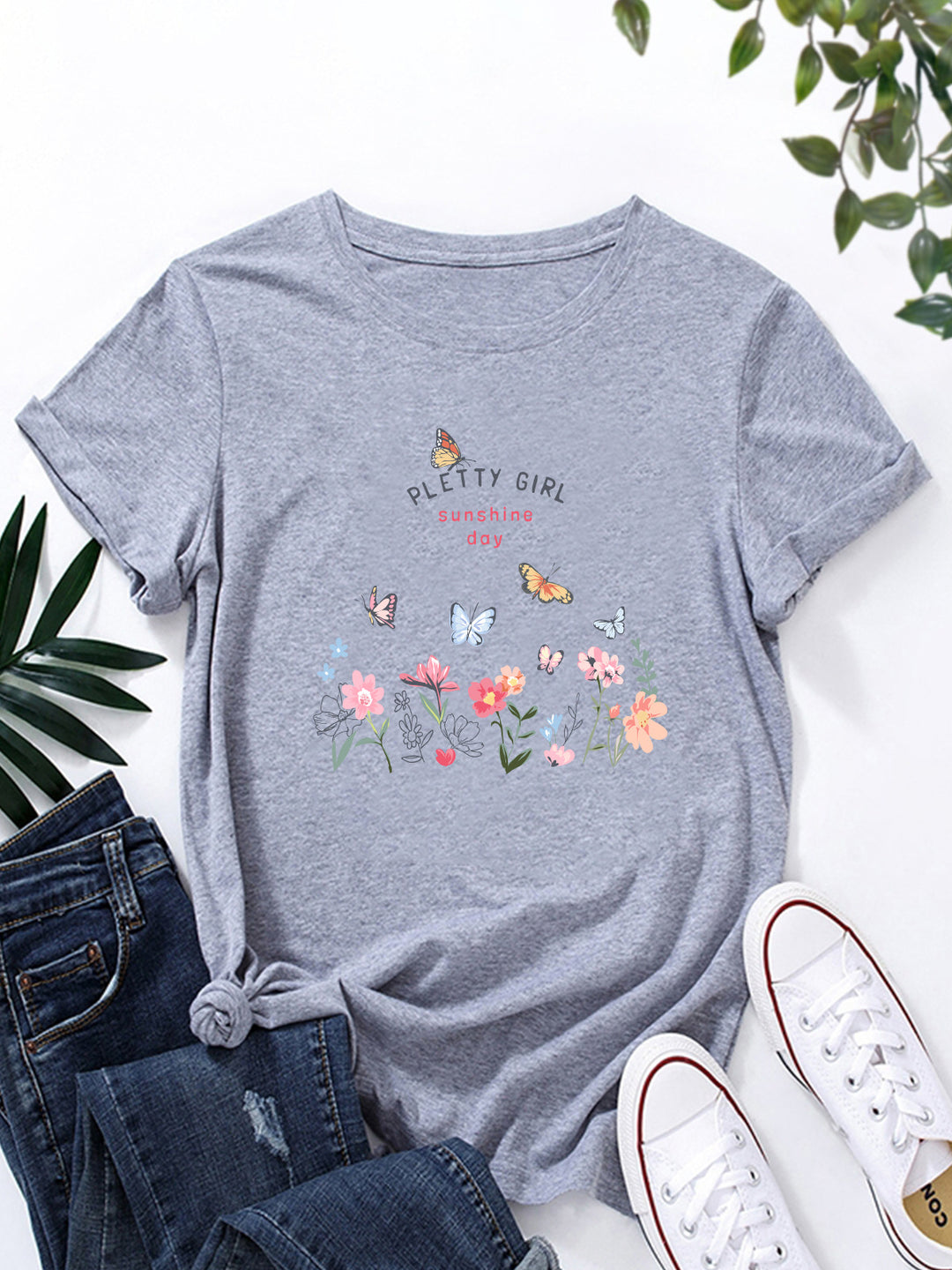 T-shirt pour femmes avec imprimé floral ludique et imprimé élégant Chic & Stil