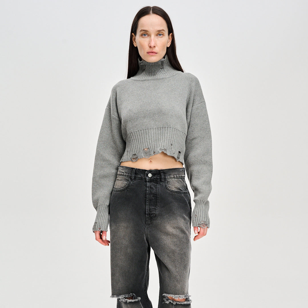 Trendy cropped sweater for women with a modern ribbed design and playful details Lune London