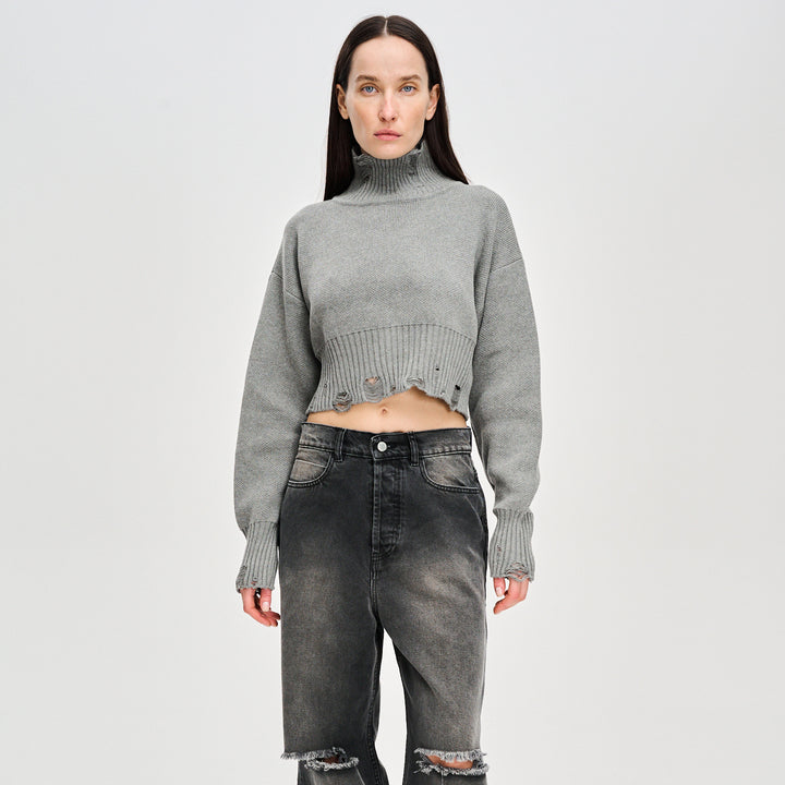 Trendy cropped sweater for women with a modern ribbed design and playful details Lune London