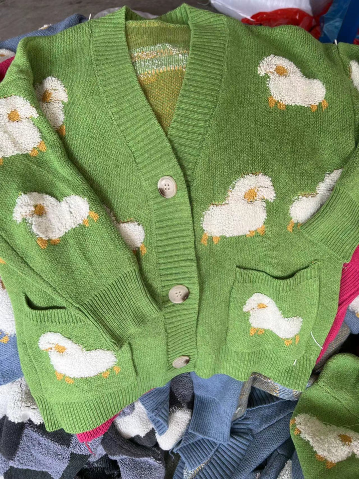 Women’s knit jacket with playful sheep pattern and pockets Lune London