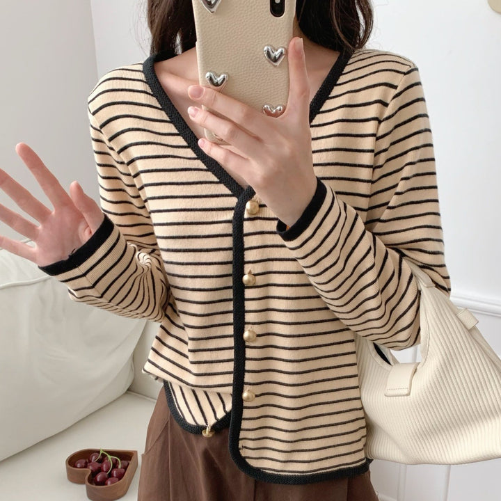 Ladies striped cardigan with elegant buttons and modern V-neck