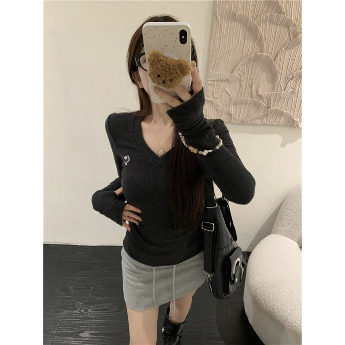 Women's long-sleeve shirt with V-neck and elegant rib structures Chic & Stil