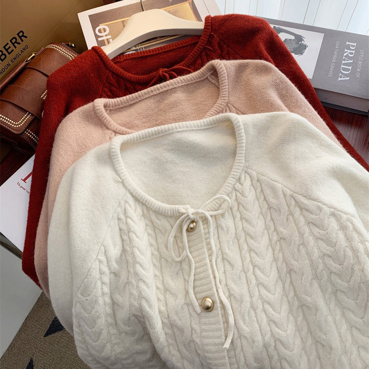 Women’s knitted jacket with embossed pattern and decorative button details Lune London