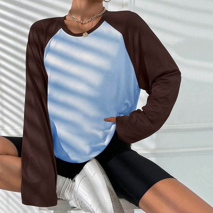 T-shirt à manches longues pour femmes avec une coupe raglan sportive et un design color block tendance Chic & Stil