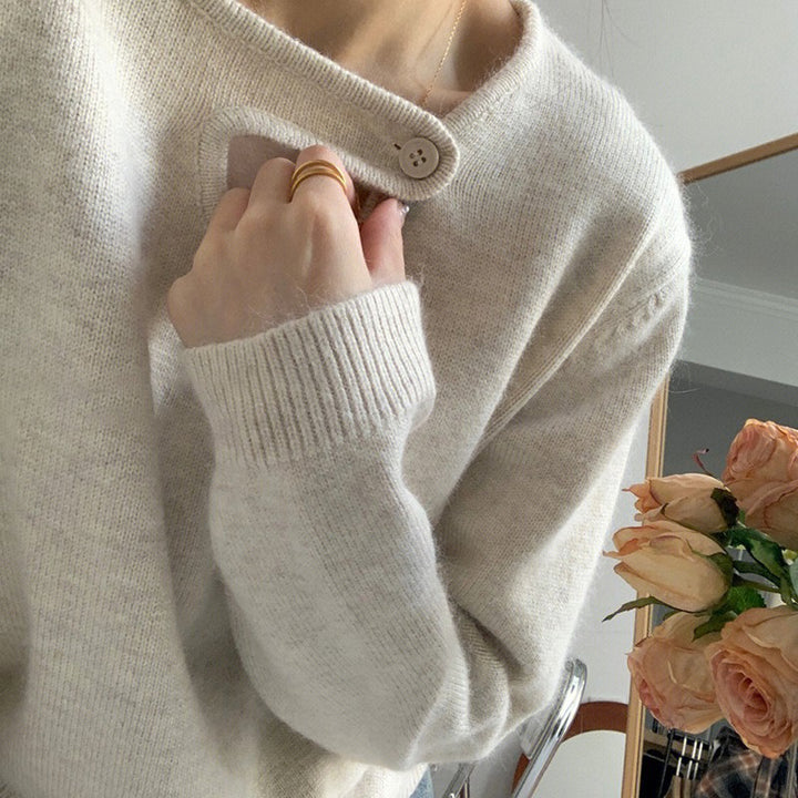 Pull femme avec détail de bouton innovant et coupe décontractée Chic & Stil