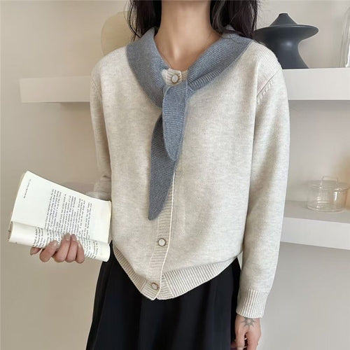 Fashionable women's cardigan with decorative scarf and button details Lune London