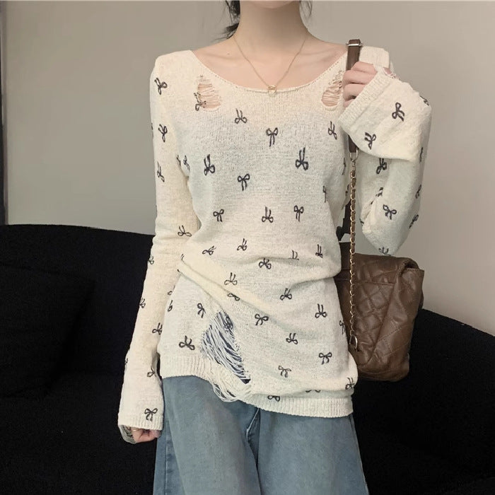 Women's long sleeve shirt with stylish rips and playful motif Lune London