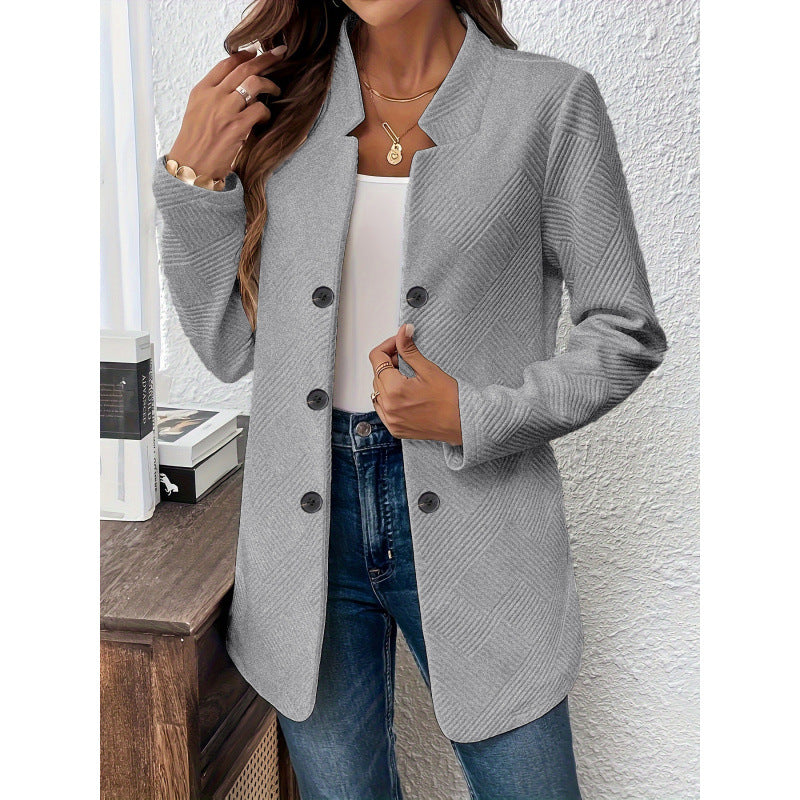 Classic women's blazer with a structured design and modern button details Lune London