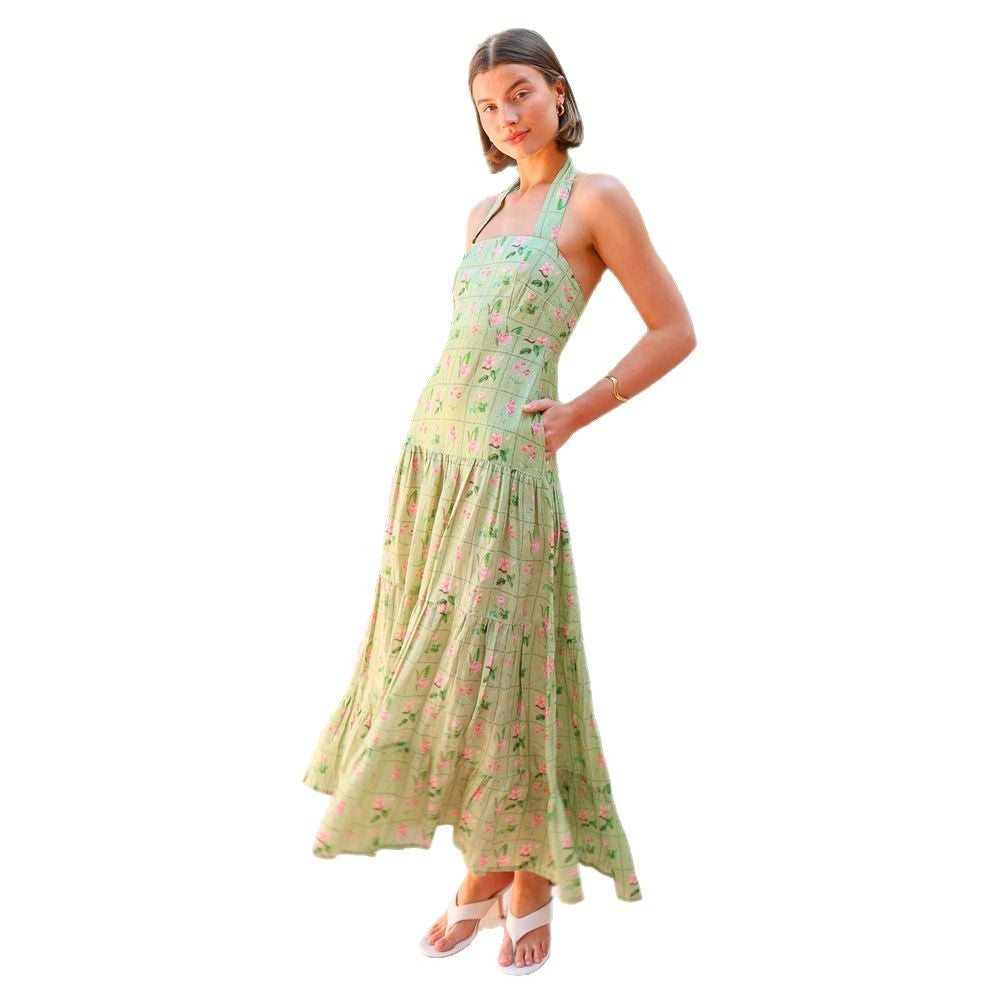 Women’s maxi dress with playful halterneck design and floral pattern mix Lune London