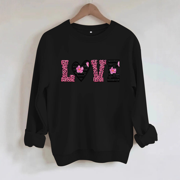 Sweatshirt femme avec design moderne de cœur léopard et coupe confortable Chic & Stil