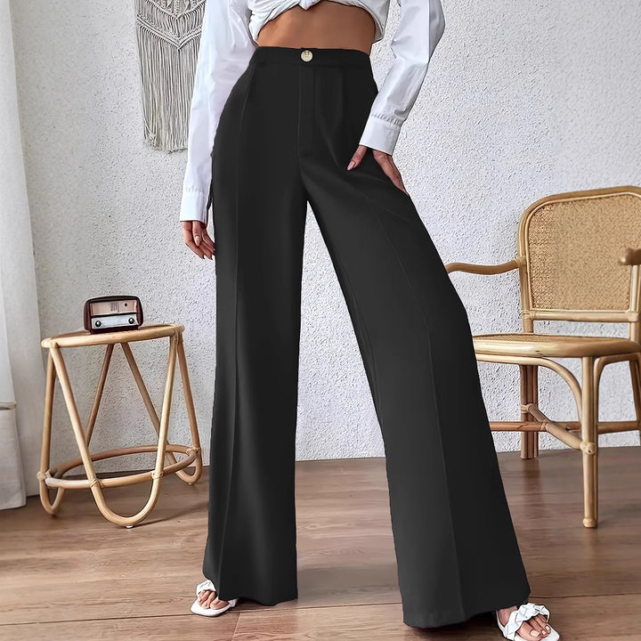 Wide palazzo pants for women with a stylish high waist cut and a button detail Lune London