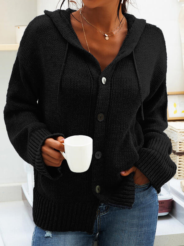 Ladies chunky knit cardigan with hood and practical pockets Lune London