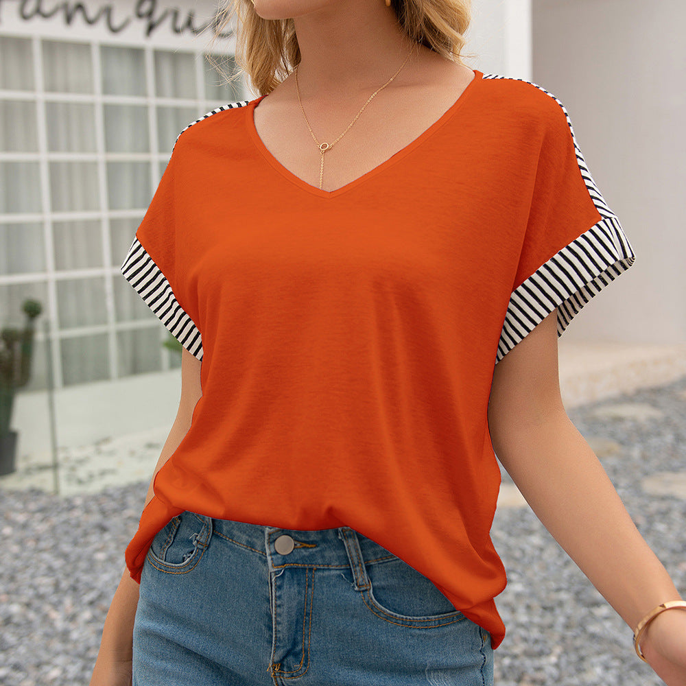 Casual women's T-shirt with a V-neck, striped sleeves, and a loose fit Lune London