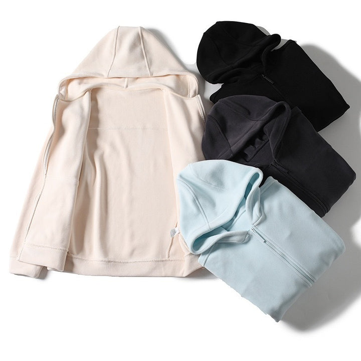 Haut en molleton pour femmes avec zip intégral et poches kangourou Chic & Stil