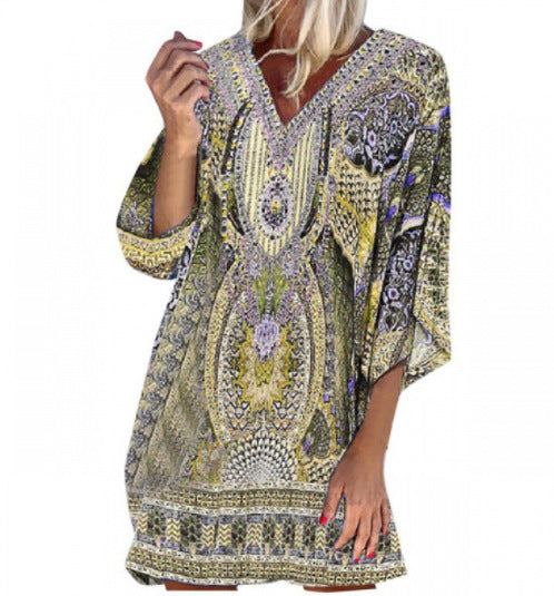 Light kaftan dress for women with a deep V-neckline and bell sleeves Lune London