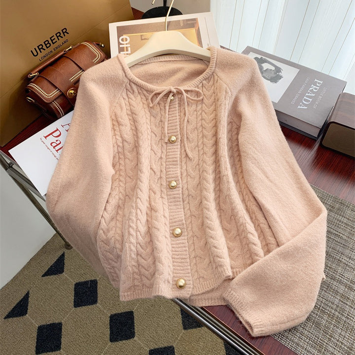 Women’s knitted jacket with embossed pattern and decorative button details Lune London