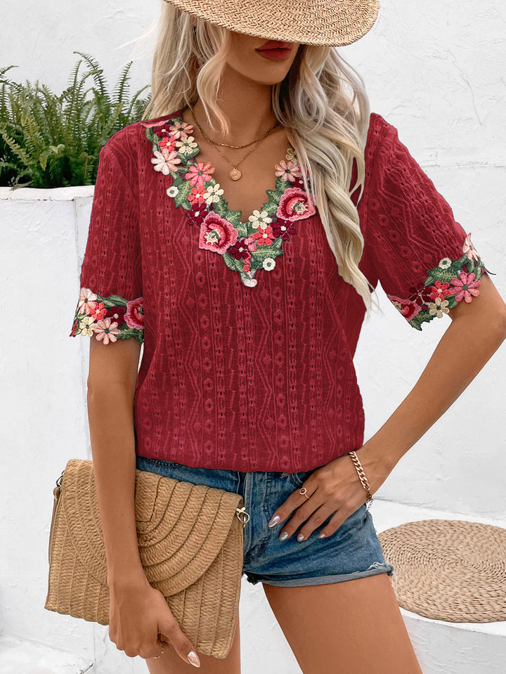 Blouse for women with floral embroidery and airy sleeves Lune London
