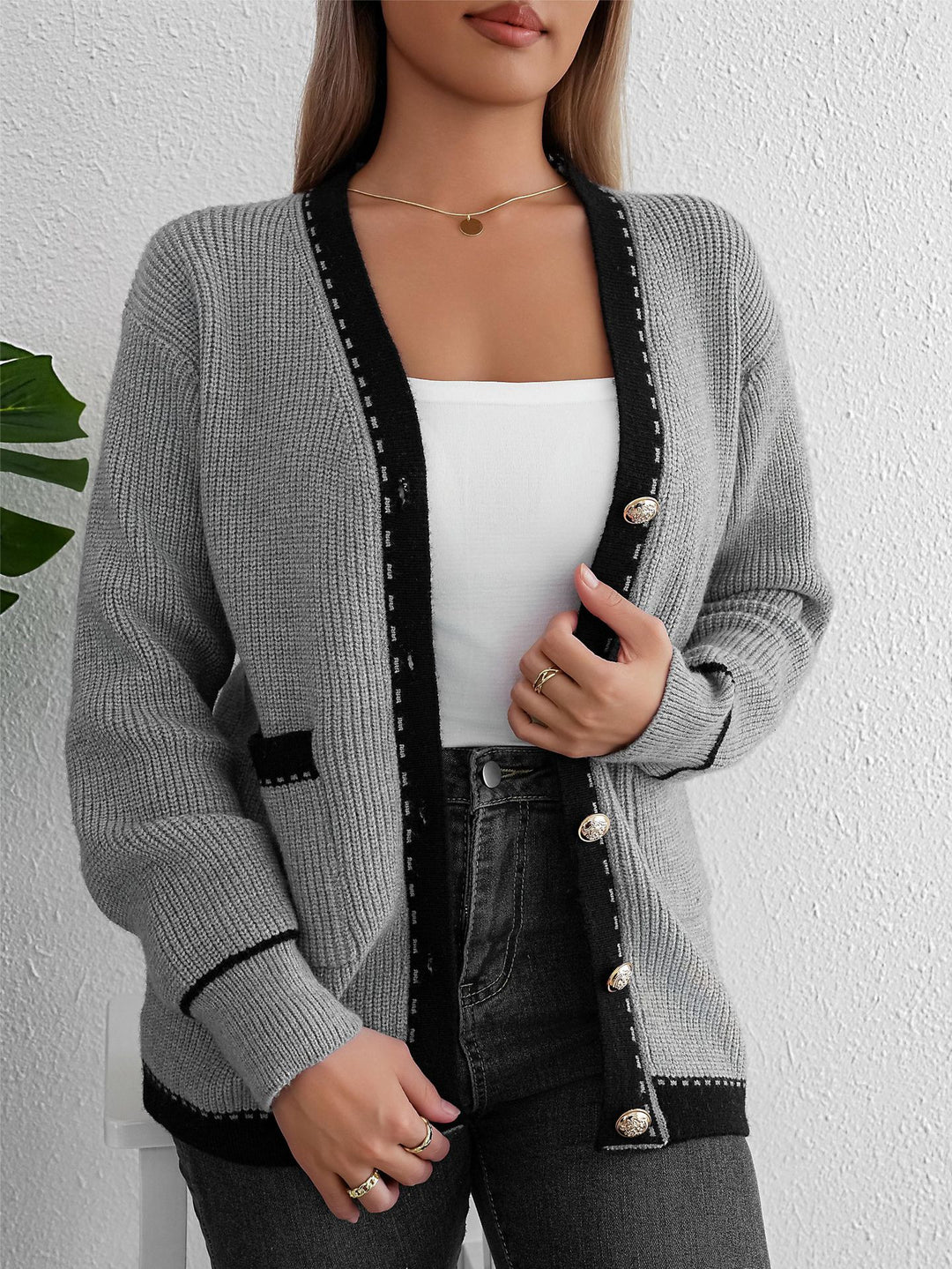 Women's knit jacket with elegant button details and contrasting stripes Lune London