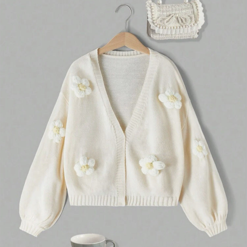 Short jacket for women with playful flower appliqués Lune London