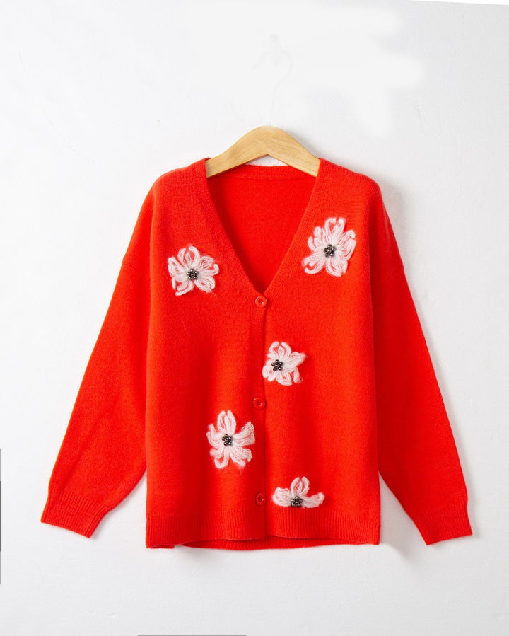 Women’s knitted jacket with floral pattern and elegant button placket Lune London