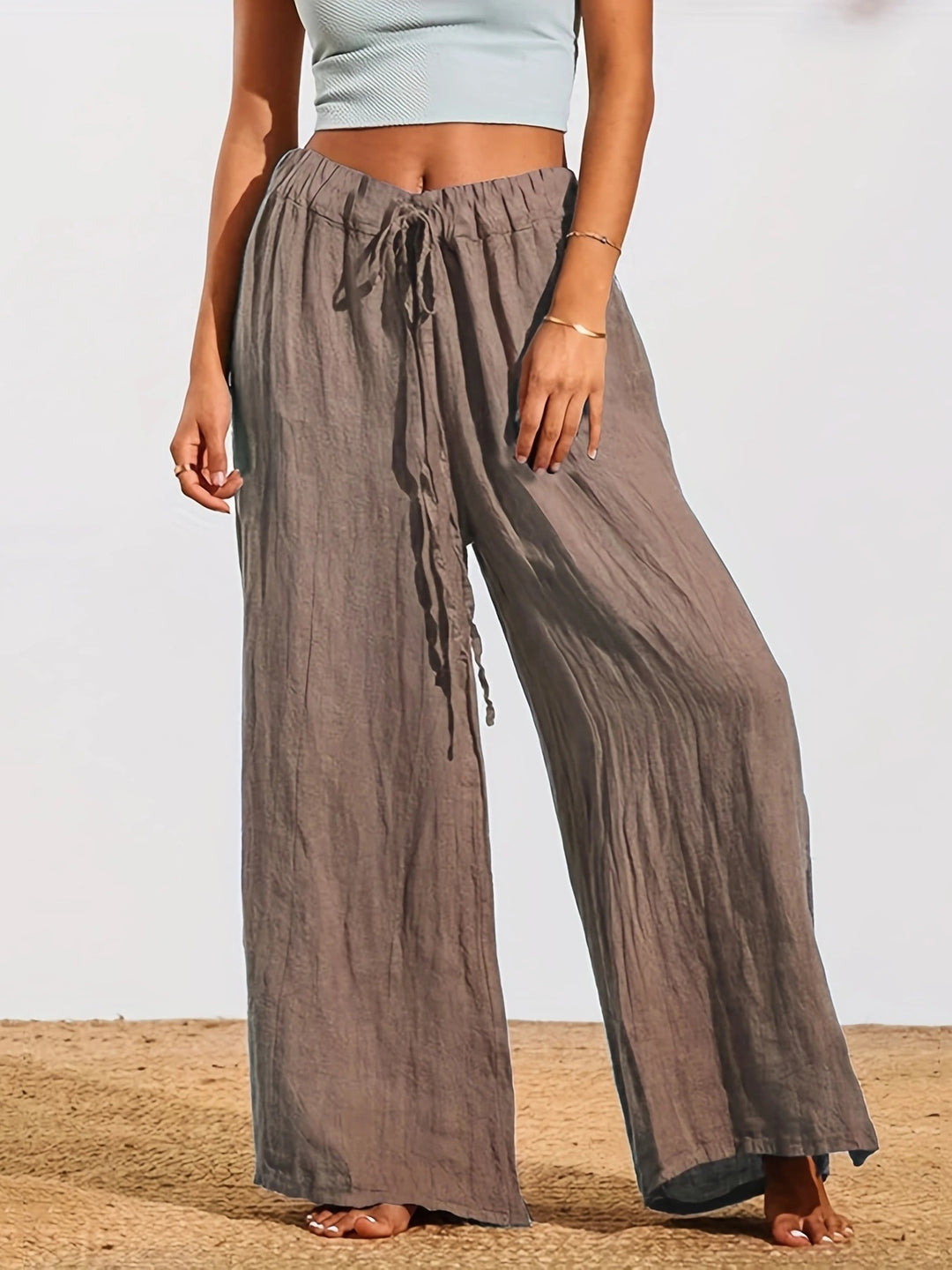 Loose summer pants for women with elastic waistband and practical drawstring Lune London