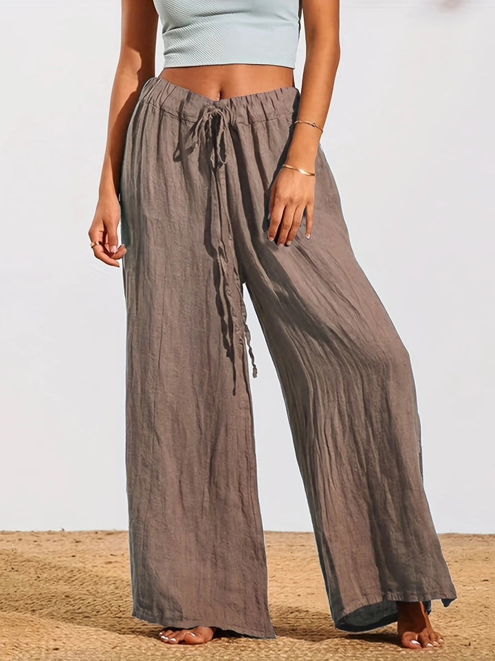 Loose summer pants for women with elastic waistband and practical drawstring Lune London