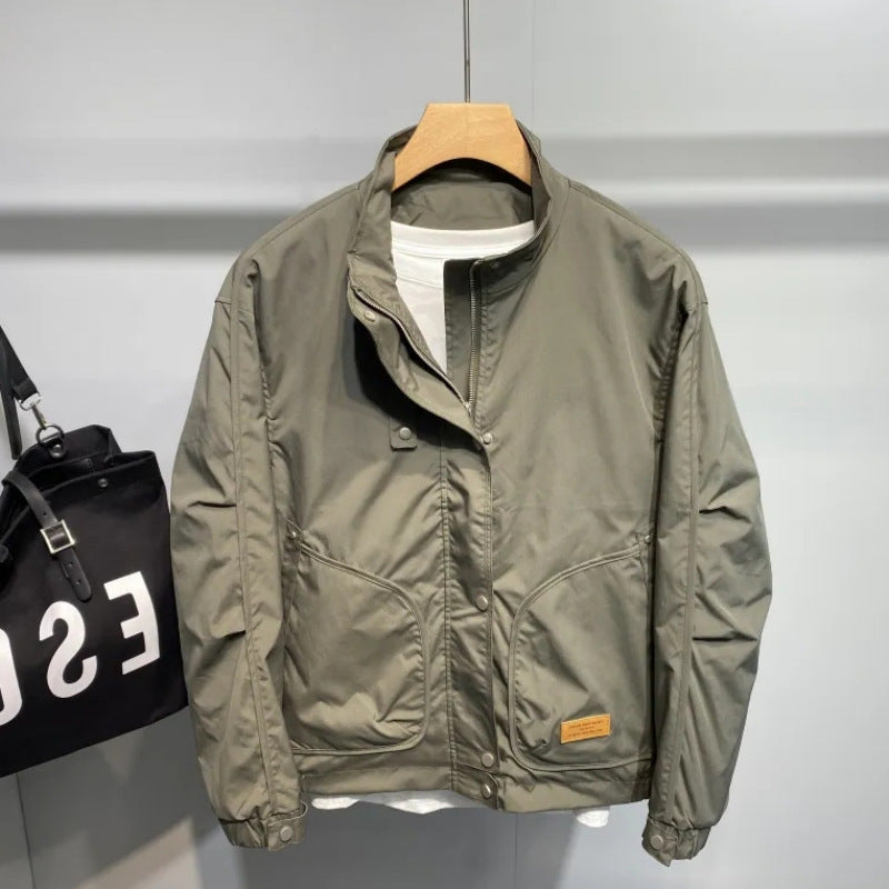 Durable transition jacket for men with practical pocket arrangement and adjustable collar Lune London
