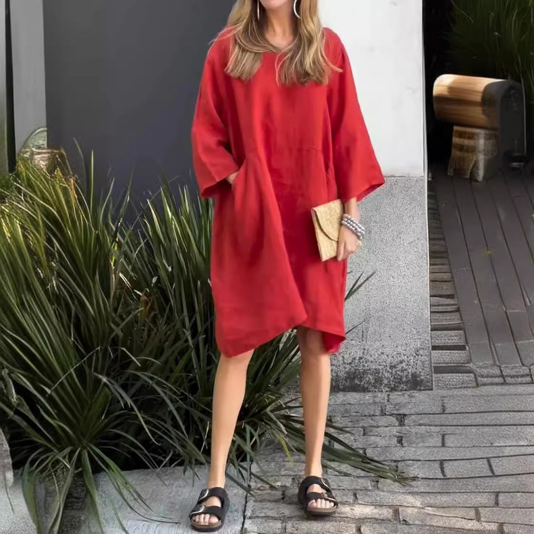 Casual linen dress for women with practical pockets and asymmetrical hem Lune London