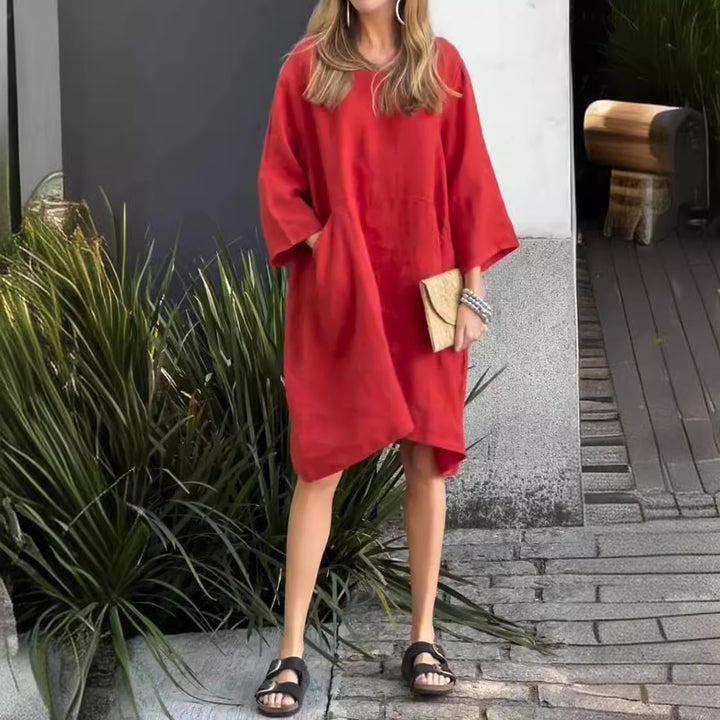 Casual linen dress for women with practical pockets and asymmetrical hem Lune London