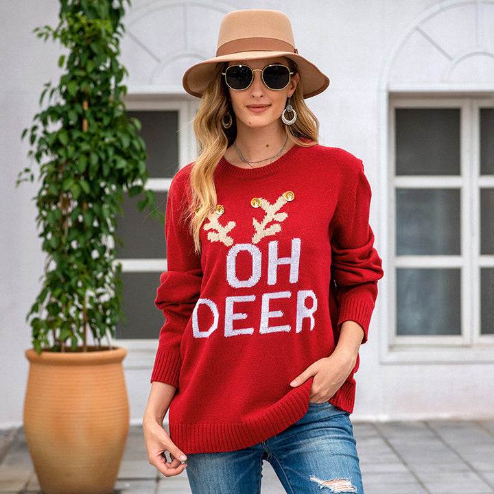 Knitted sweater for ladies with festive reindeer pattern and gold buttons Lune London