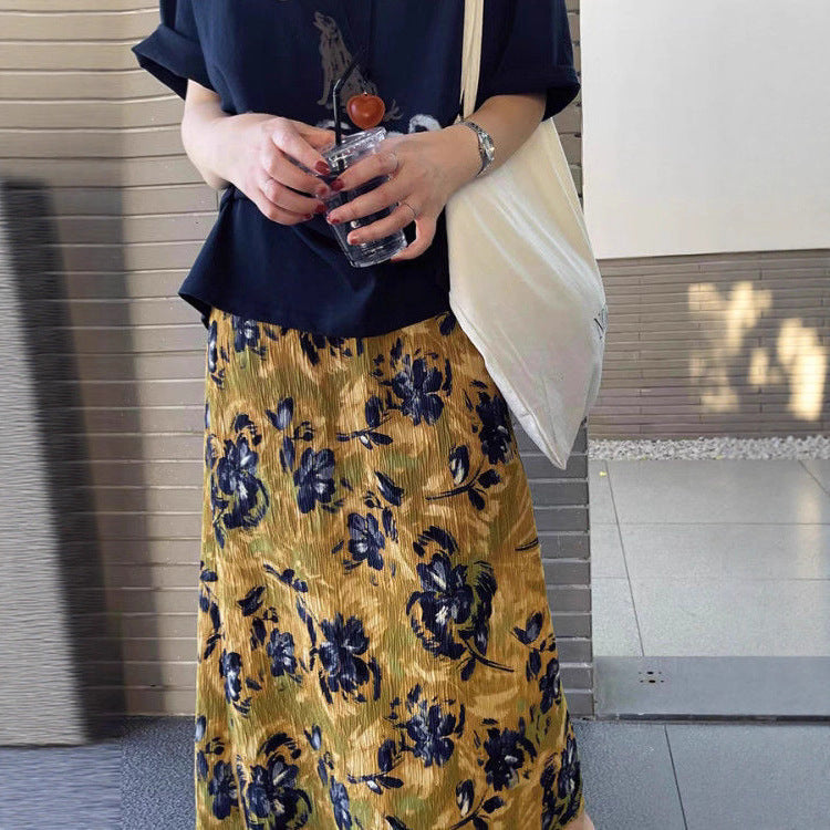 Maxi skirt for women with elegant pleats and floral appliqués Lune London
