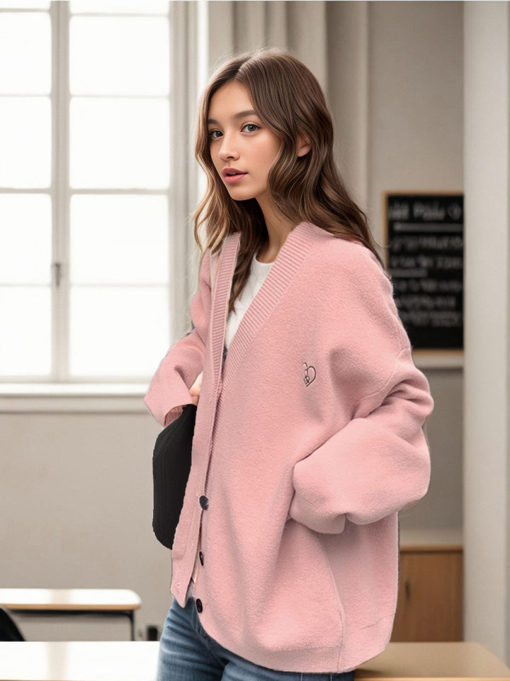 Ladies Chunky Knit Cardigan with oversized cut and decorative heart pattern Lune London
