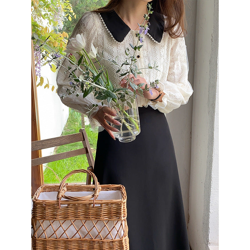 Women elegant blouse with lace collar and decorative button details Chic & Stil